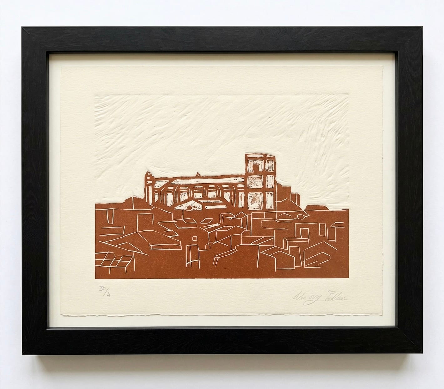 Linocut engraving of the rooftops and church of Alaior, Menorca